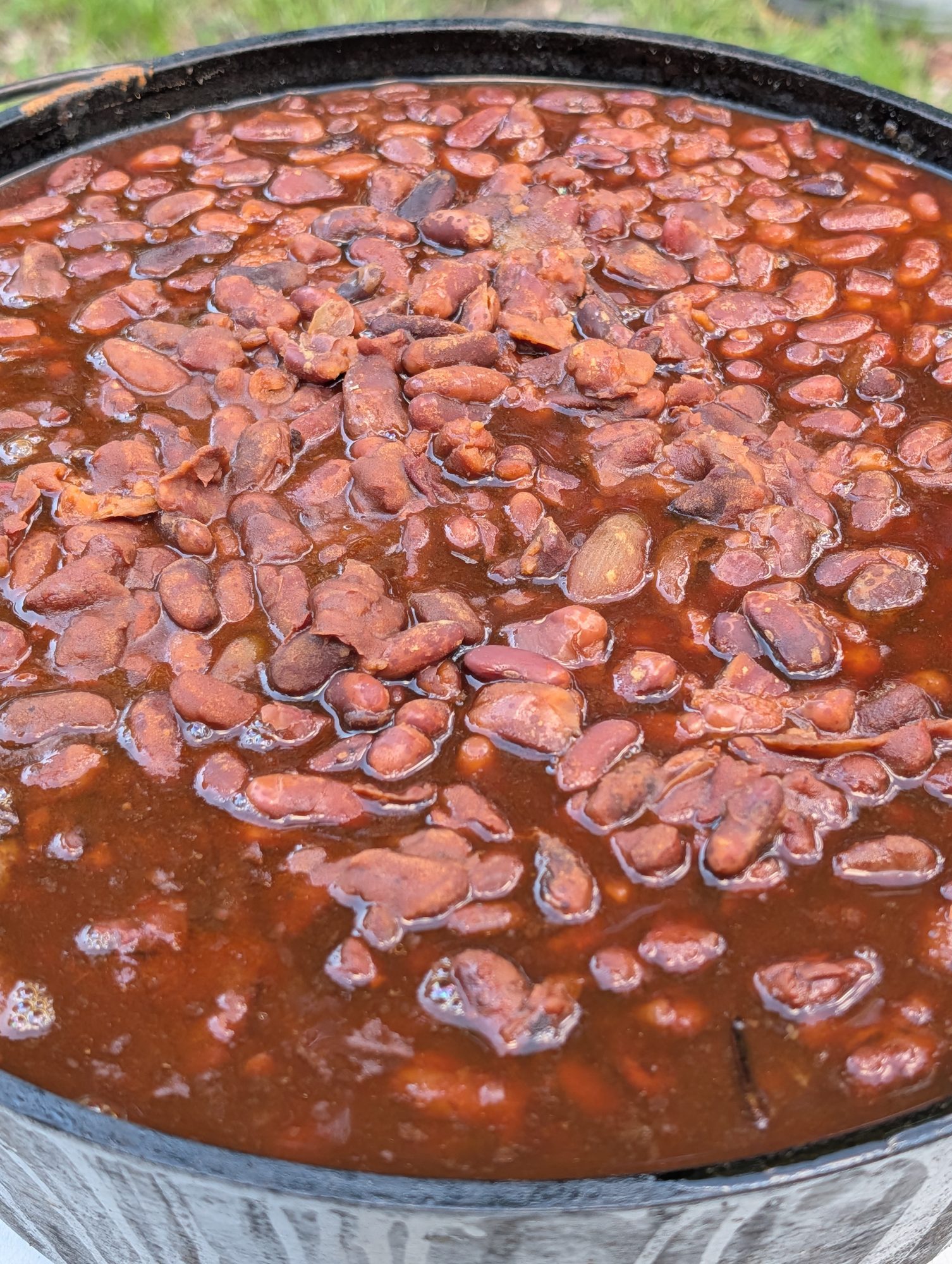 A cast-iron pot brimming with the Rally's bean-hole baked beans